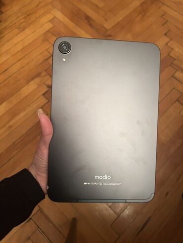 Modio: Modio planşet Xüsusiyyətlər: - Qara rəngdə, nazik alüminium gövdə — 3