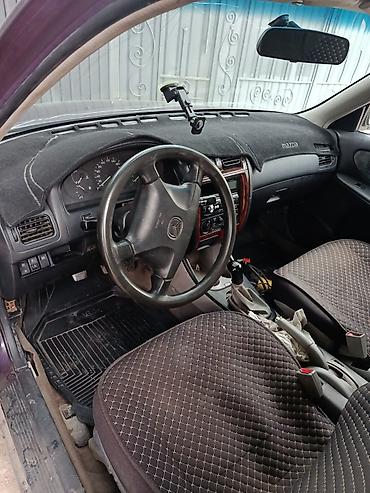 Mazda: Mazda 323: 2000 г., Универсал — 5