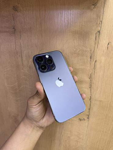 mini 3 pro: IPhone 14 Pro в фирменном тёмно-фиолетовом цвете. Смартфон с плоскими — 4