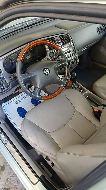 амыватель: Nissan Primera: 2001 г., 2 л, Автомат, Бензин, Универсал — 5