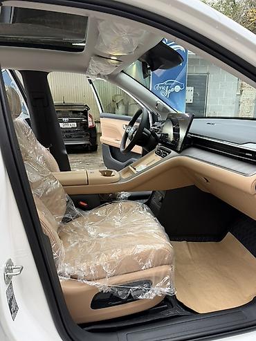 GAC: Версия электро 650 км Белый на песочном Комплектация “Advanced — 7