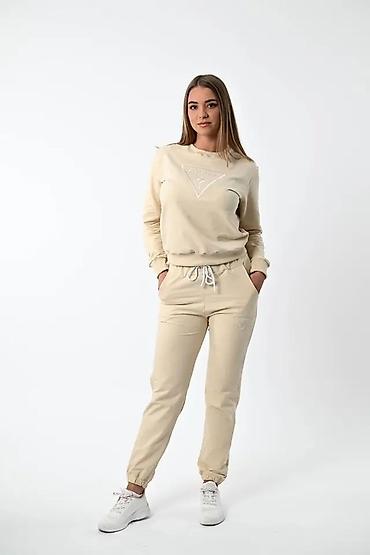 Gornji i donji deo: Ženski komplet trenerke – duks + donji deo - Model: jednobojni — 6