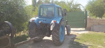 Тракторы МТЗ (Беларус): Трактор МТЗ «Беларус» с кабиной, сзади трехточечная навеска и ВОМ — 9