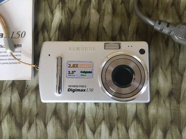Foto və videokameralar: Samsung Digimax L50. Problemi rənglərin çox ağ çıxmasıdlr. Tam dəsti
