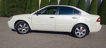 90 fa 373: Kia Optima: 2.7 l | 2008 il Sedan — 3