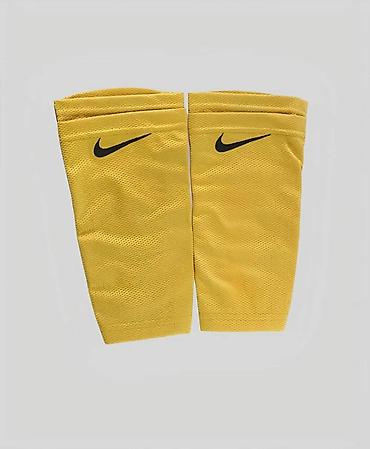 футбол: Гетры-рукава Nike (пара), цвет: жёлтый. - Лёгкая дышащая сетчатая — 1