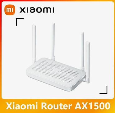 Модемы и сетевое оборудование: Wi-Fi роутер "Xiaomi" Router AX1500 Плавная работа — 1