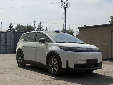 аудио техника: Aion Y — компактный электрический кроссовер/MPV форм‑фактора. Кузов — 3