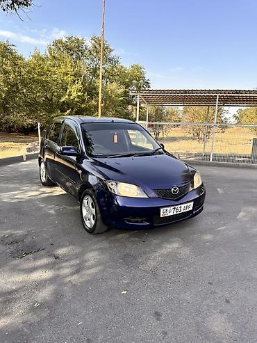 camry 5: Mazda Demio: 2004 г., 1.5 л, Автомат, Бензин, Хэтчбэк — 3