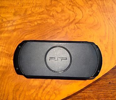 psp 4: Sony PSP (PlayStation Portable) əl konsolu Xüsusiyyətlər: - Model — 1