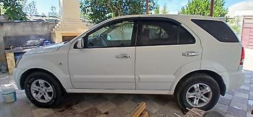 kia bongo: Kia Sorento “Limited” – ağ rəngli, 5 qapılı SUV Xüsusiyyətlər: - — 6