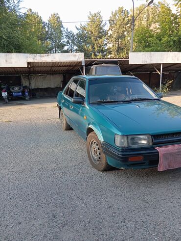 Mazda: Mazda 323: 1989 г., 1.5 л, Механика, Бензин, Седан