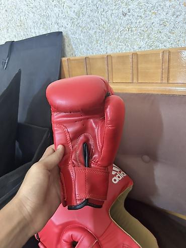 tikis aparati: Məhsul: Boks/MMA qoruyucu dəsti Tərkibi: - Adidas baş qoruyucusu – — 5
