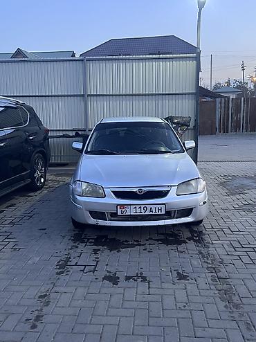 saab 93: Mazda 323: 2000 г., 1.6 л, Механика, Бензин — 8