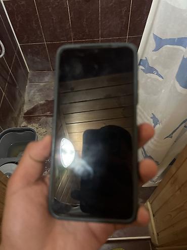 редмм 9: Смартфон Redmi (серия Note) в бирюзовом цвете. Основные — 2
