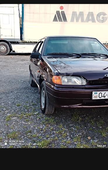 lada 2115: Lada Samara (VAZ 2115), tünd qəhvəyi rəng. Sedanikə bənzər 5 qapılı — 2