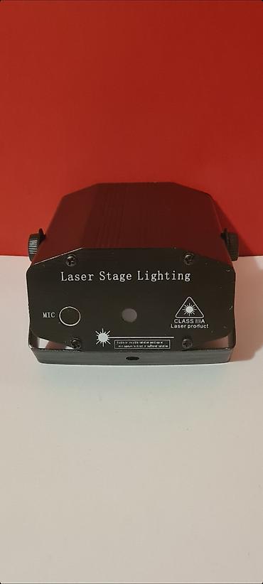 Projektori: - Mini Laser Stage Lighting najpopularniji light efekat. - Polovan — 3