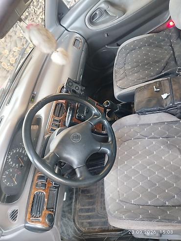 кронос: Mazda 626: 1995 г., 1.8 л, Механика, Бензин, Седан — 2