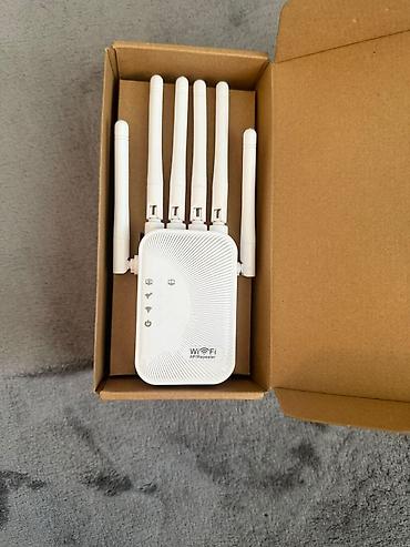 Masaüstü kompüterlər və komponentlər: Wi‑Fi Gücləndirici / AP Repeater - Rəng: ağ - 2.4 GHz tezlik zolağı - — 1
