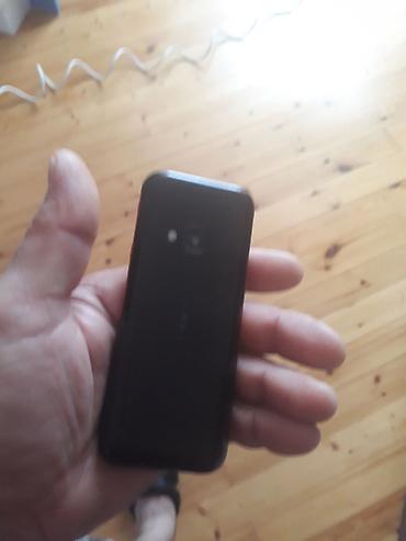 Digər mobil telefonlar: Model: nokia (düyməli telefon) Xüsusiyyətlər: - Korpus: kompak, qara — 3