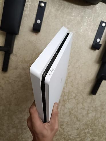 kablolar: PS4 Slim 500GB ağ rəngdə satılır. • Ən son sistem versiyası • Bütün — 3