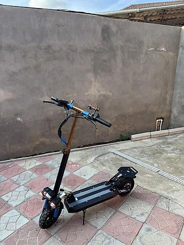 самокат для трюков: Elektrikli skuter – güclü və komfortlu şəhər/əngebəli yol gedişi üçün — 7