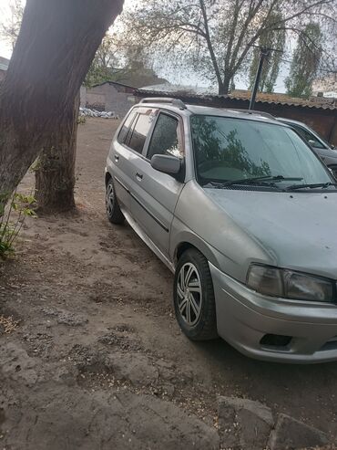 арзан автомобиль: Mazda Demio: 1999 г., 1.3 л, Автомат, Бензин, Седан