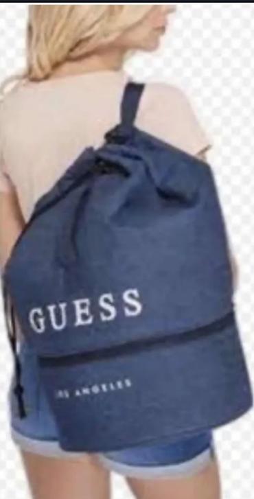 Topovi: Atraktivan Guess original nov korset od teksasa sa biserima, M — 10