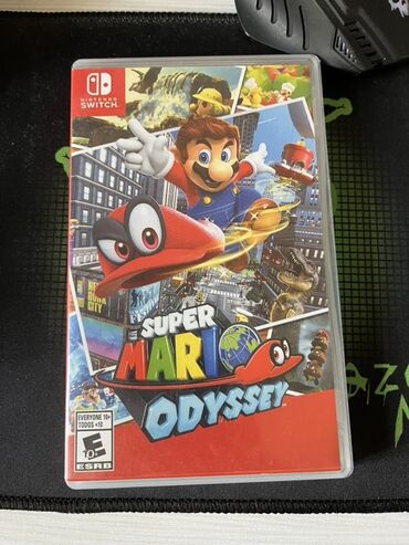 мортол комбат: Игра Super Mario Odyssey для Nintendo Switch. На обложке изображен