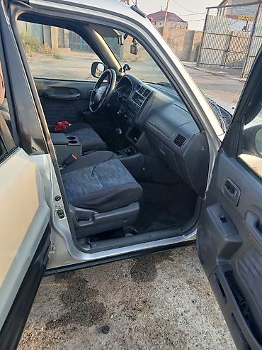 guzguler: Toyota RAV4: 2 l | 1997 il Ofrouder/SUV — 7