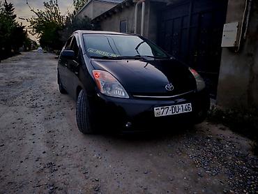 Avtomobil satışı: Toyota Prius (2-ci nəsil) – qara rəngli, hatchback kuzov. Əsas — 2