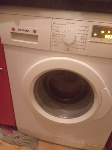 Paltaryuyan maşınlar: Siemens markalı bu paltaryuyan maşın ağ rəngdədir və ön tərəfində
