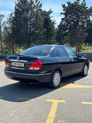 mini canta: Nissan Sunny: 1.6 l | 2006 il Sedan — 8