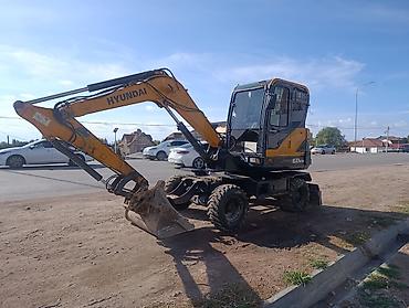 е34 4 4: Экскаватор, Hyundai, Колесный — 3