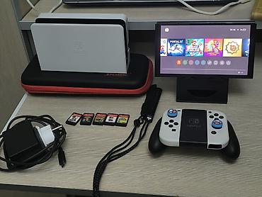 прошивка nintendo switch oled: Nintendo Switch OLED (модель с белыми Joy‑Con) — комплект для дома и — 1