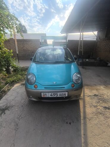 по следующий выкуп авто: Автомобиль Daewoo Matiz бирюзового цвета с компактным кузовом хэтчбек