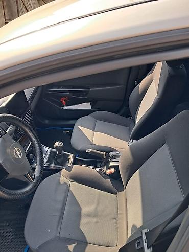 Opel: Opel Astra H – 5 qapılı hetçbek Xüsusiyyətlər: - Kuzov: 5 qapılı — 10