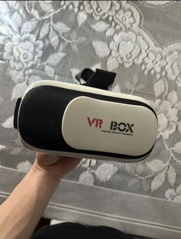 x box x: VR Box virtual reallıq eynəyi. Bu eynək, smartfonunuzu istifadə edərək
