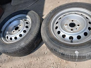 topdan teker satisi r14: 4 ədəd dəmir disk təkərlə birlikdə satılır. Disklər 4 bolt — 1