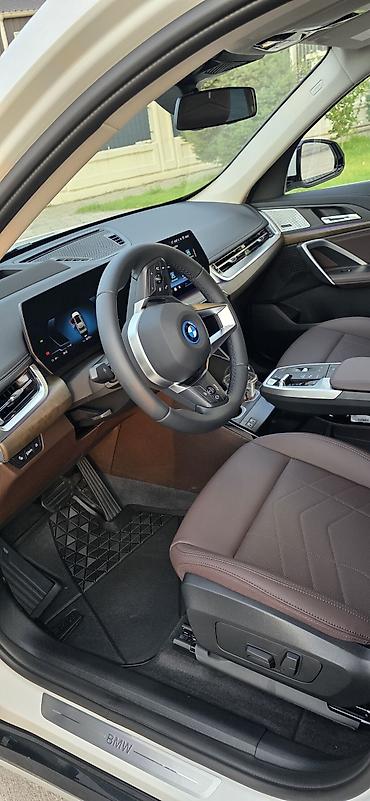 e 303: BMW iX1: 2025 г., Автомат, Электромобиль, Кроссовер — 10
