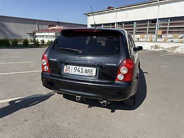 Транспорт: Mazda 323: 2002 г., 1.6 л, Механика, Бензин, Хэтчбэк — 4