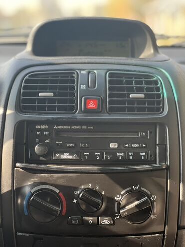 Mitsubishi: Mitsubishi Space Star: 2004 г., Хэтчбэк — 7