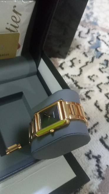 Aksesuarlar: Brend: Cartier (qutu və aksesuarlarla) Model: Düzbucaqlı kadranlı — 2