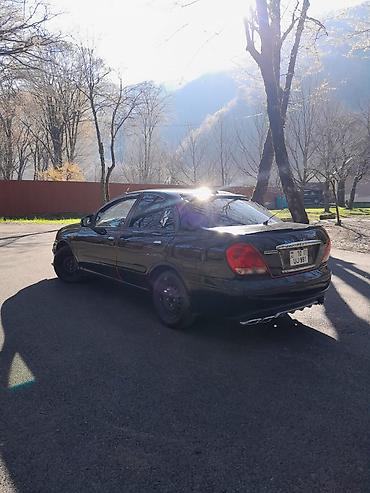 chevrolet aveo oluxana: Nissan Sunny sedan – qara rəng, 4 qapı, ön-çəkiş. Xüsusiyyətlər: - — 2