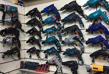 Elektrik dəstəyində işləyən şnur­lu zərbəli və adi qazma aparatları — 1