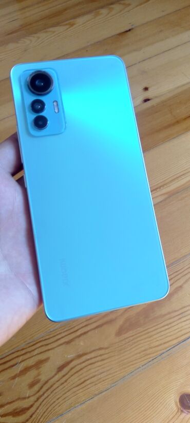 xiomi 12 x: Xiaomi Redmi Note 13, 128 GB, rəng - Qara, 
 Barmaq izi, İki sim kartlı