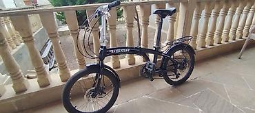 eliptik velosiped: Qatlanan şəhər velosipedi – USMA - Konstruksiya: orta hissədən — 1