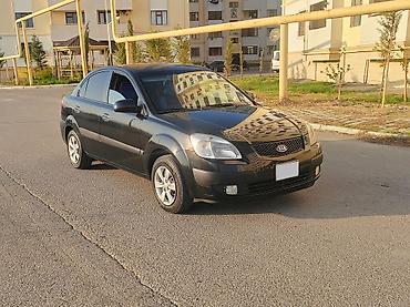 volkswagen passat 1: Kia Rio: 1.4 л | 2008 г. Седан — 1