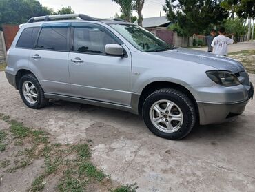 кросовый мотоцикл: Mitsubishi Outlander: 2003 г., 2.4 л, Механика, Бензин, Внедорожник