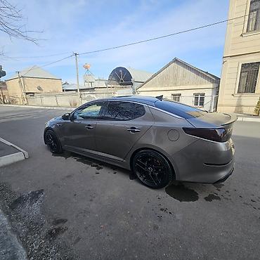 kia optima spoyler: Kia Optima Turbo – sedan Xüsusiyyətlər: - Turbo benzin mühərriki — 8